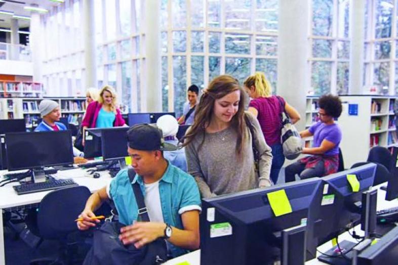 Students infront of computers.