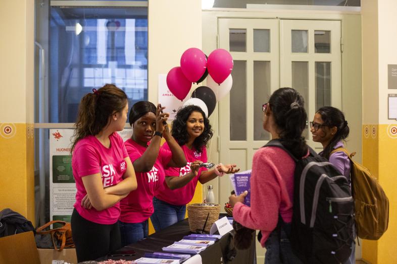 Student Ambassadors wearing Ask Me! T-shirts