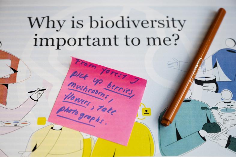 Post it note on top of a paper